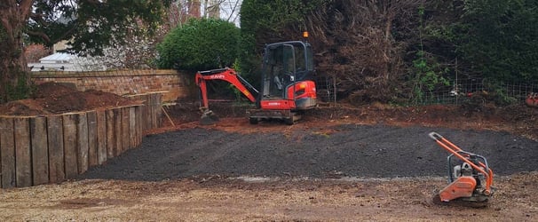 digger and whacker plate in an oldbury garden