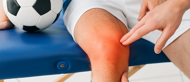 Visual definition of sports injury: muscle strain, ligament tear, joint dislocation.