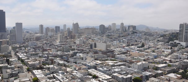 a city skyline view of san francisco with tall buildings