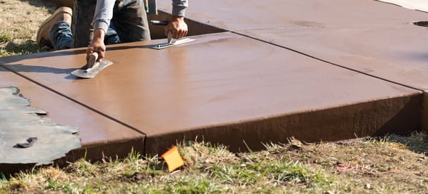 a man is using a sanded in concrete