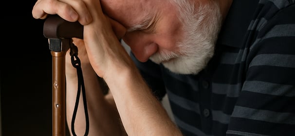 Elderly person with parkinsons disease receiving physiotherapy to improve mobility and balance