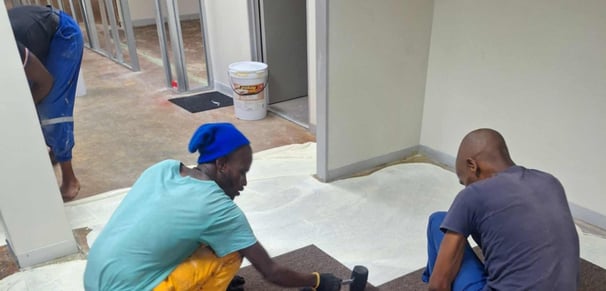 Laying of carpeting system, Fourways Golf Estate, Selbourne building, Sandton