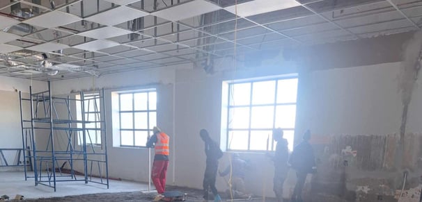 Belair Mall interior renovation – commercial ceiling fit-out with scaffolding and lighting upgrades.