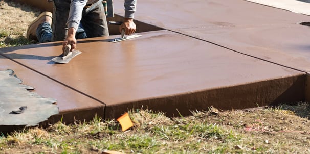 a man is using a sanded in concrete