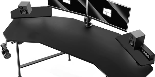 a computer desk with two monitors and a monitor