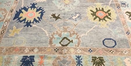 Explore handmade Turkish Oushak rugs crafted with organic handspun wool and natural dyes.