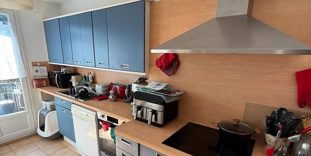 a kitchen with a stove top oven and a stove top