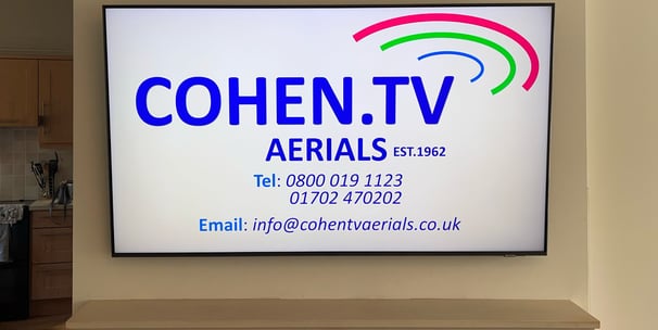 tv mounted on wall