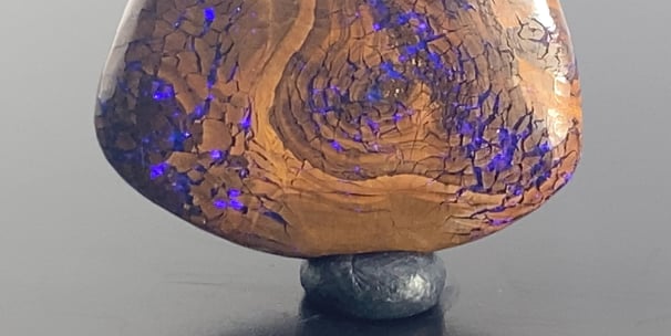 Purple flashes amongst Ironstone. Unique Queensland Boulder Opal from Australia.