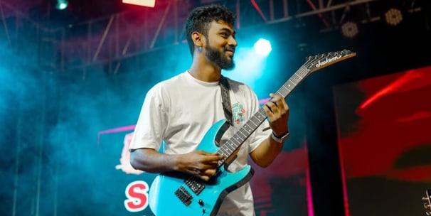 Live singer performing at an outdoor wedding in Bengaluru."