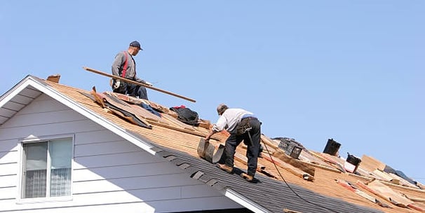 Roofers working on a roof
