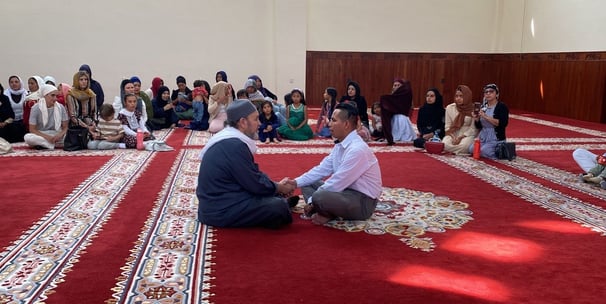 Shahada. A man accepting Islam in the Imam Malik Mosque Mexico