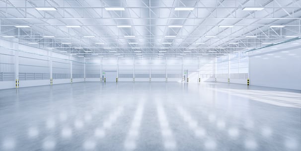 An empty warehouse with LED lighting