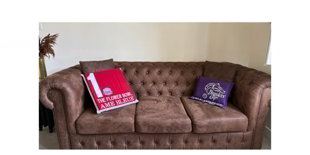 a couch with pillows and pillows on it