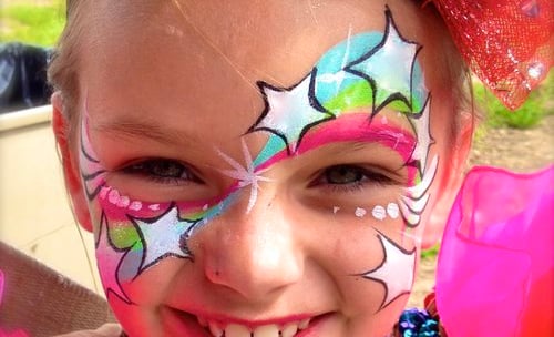A Neon Rainbow Star Face Painting Design