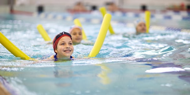 child learning to swim