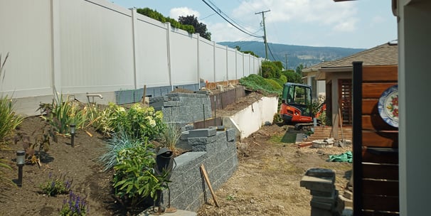 Retaining wall and landscaping using excavator, okanagan