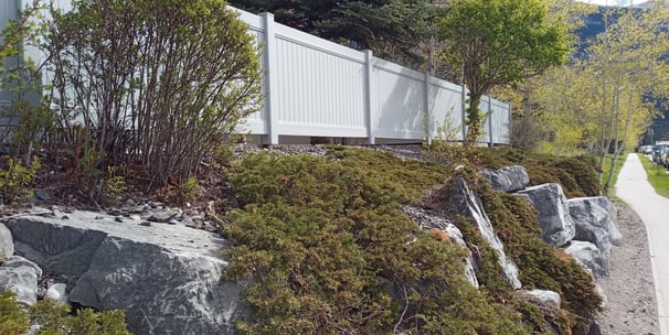 Vinyl fence around multi-unit residential strata complex, Canmore