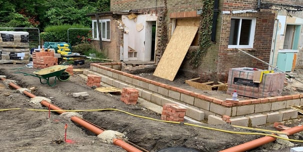 Groundwork contractor preparing site for construction