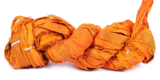 Hand-Woven from vintage silk saris, this super bulky weight yarn is perfect not just for knitting