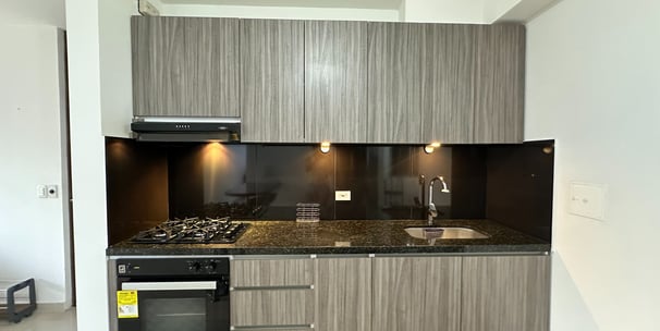 a kitchen with a stove top oven and a stove top oven