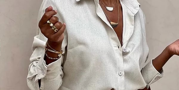 a woman in a white shirt and white pants