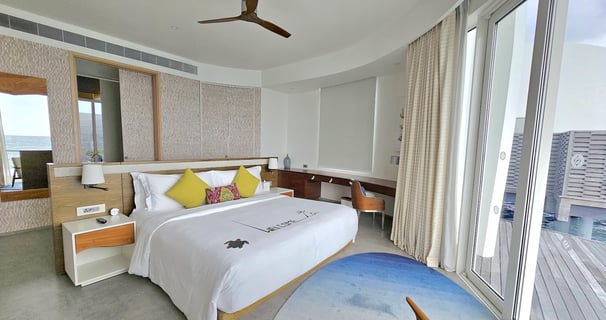 Jumeirah Olhahali Island Maldives overwater villa bedroom