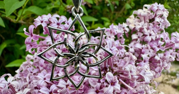 Lotus Flower Sterling Silver Necklace on Lilac Flowers