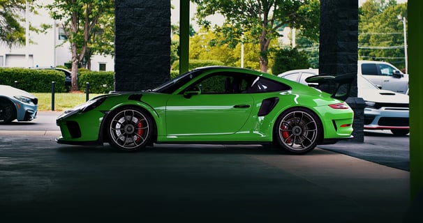 Green Porsche GT3 RS car photography at 704 Exotics.