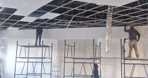 Commercial ceiling renovation – Belair Mall tenant improvements with ducting and grid ceiling
