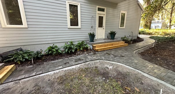 a house with a wooden deck and a wooden deck