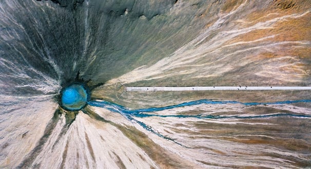 a large blue hole in the middle of a large hole  . arbab naimat kasi , balochistan ,  Chandragup