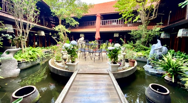 a wooden walkway leading to a wooden deck