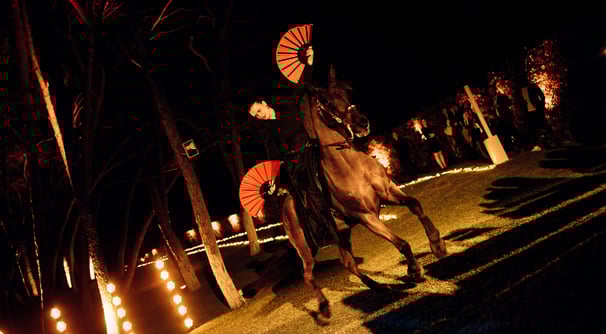 Corporate event at Villa El Rincon in Marbella featuring a live flamenco performance with horse riders.