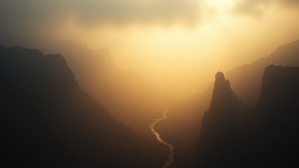 UniverseX - a mountain scene with a river and a river