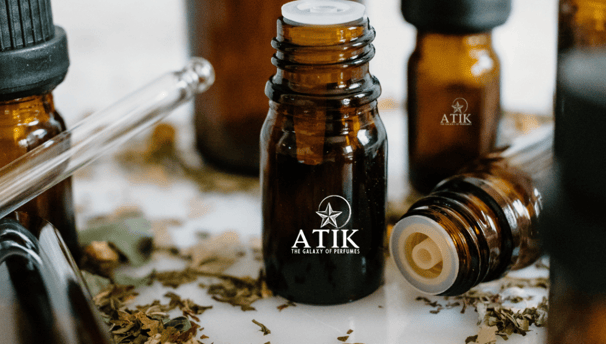 a variety of bottles of atik fragrance oils