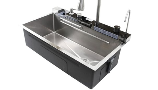 a stainless steel sink with multifunctional faucet set