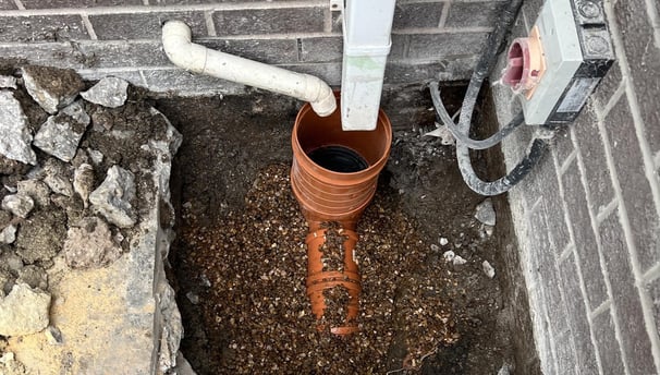 A gully in the middle of being installed in Warrington