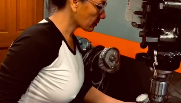 woman operating a mill