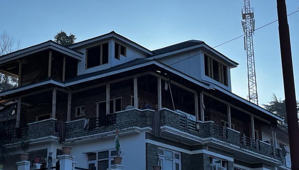 Construction of home stays 2nd and 3rd floor with wooden truss by escotten infra projects pvt. ltd.