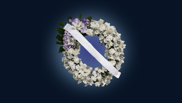 imagem mostra faixa de homenagem em coroa de flores da cortel e cemitério araçá são paulo