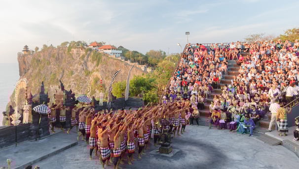 a group of people standing around a GWK Cultural Park