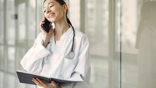 Doctor on phone with Medicare patient