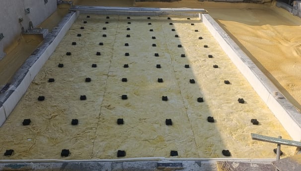 Floating floors installed for acoustic isolation in Dubai projects.