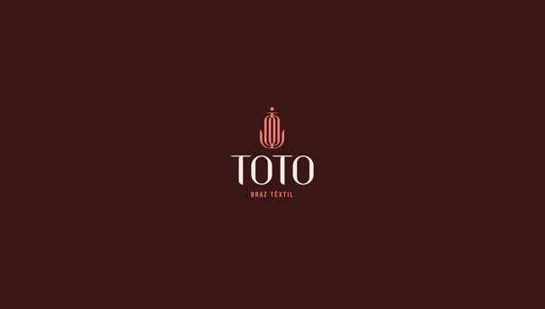 toto braz textile logo on a wine-colored background