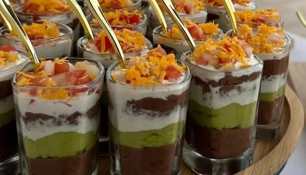 a tray of desserts with a variety of desserts