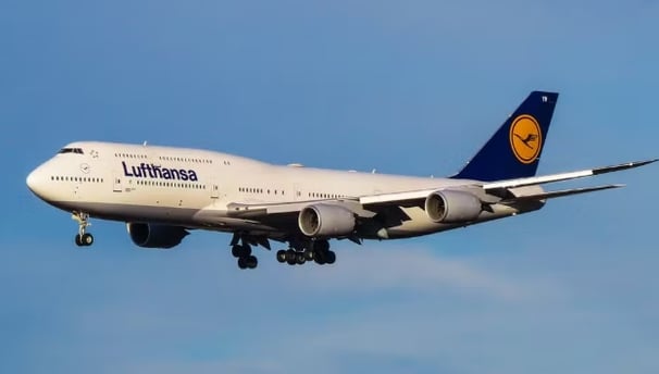 a large jetliner flying through the air