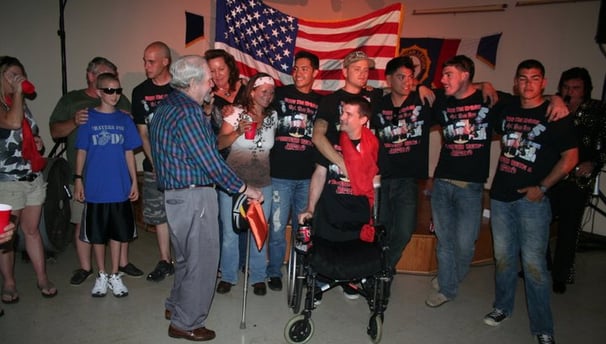 Veterans gathering at a community event, highlighting camaraderie and engagement.