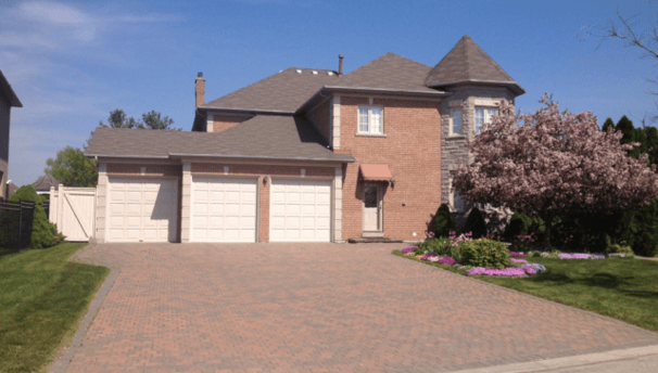 a house with a driveway and driveway with a driveway