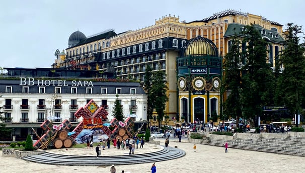 a large building with a clock tower in the middle of it